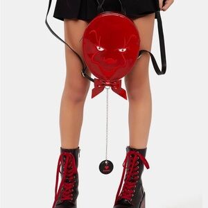 Dolls Kill Red Backpack with Face Design